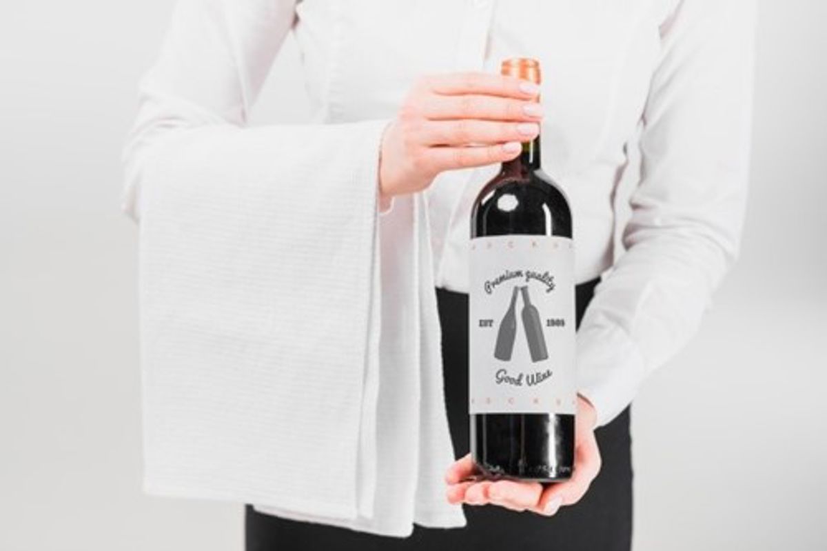 Man Presenting Wine Bottle 23 2148085955